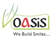 Logo Of Oasis In Special Font Merged With Devices And Slogan 'we Build Smiles..' Device mark 6334216 Trademark