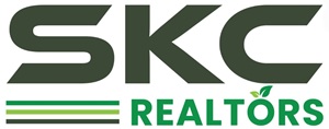 Skc Realtors Device mark 7064935 Trademark