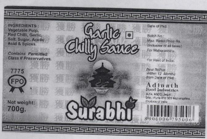 Surabhi Garlic Chily Sauce (lable, Device Of Leaves) Device mark 1451300 Trademark